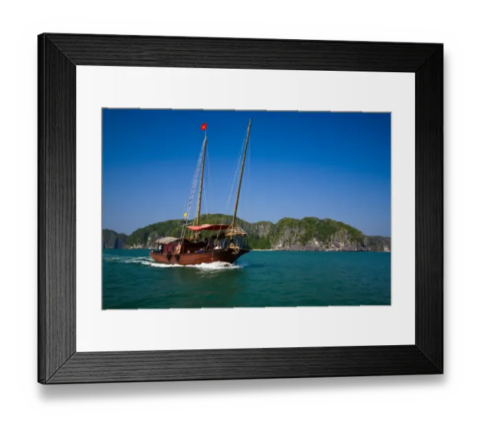 Framed Print : Vietnam, Northern Vietnam, Halong Bay. Tourist boat amid the islands of Halong Bay near Cat Ba Island Framed Print : Vietnam, Northern Vietnam, Halong Bay. Tourist boat amid the islands of Halong Bay near Cat Ba Island