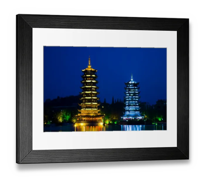 Framed Print : China, Guangxi Zhuang Autonomous Region, Guilin City. Illuminated Pagodas at dusk
