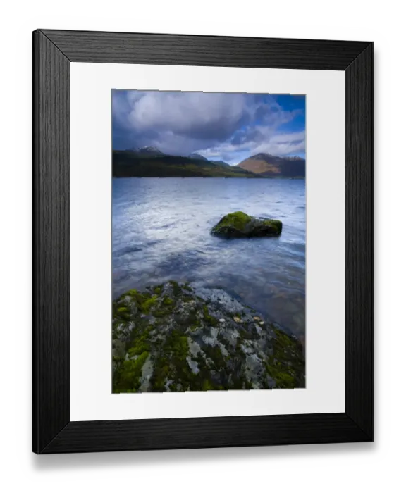 Framed Print : Scotland, Stirling, Loch Lomond and the Trossachs National Park. Moss covered boulders on Loch Lomond with mountains in Framed Print : Scotland, Stirling, Loch Lomond and the Trossachs National Park. Moss covered boulders on Loch Lomond with mountains in
