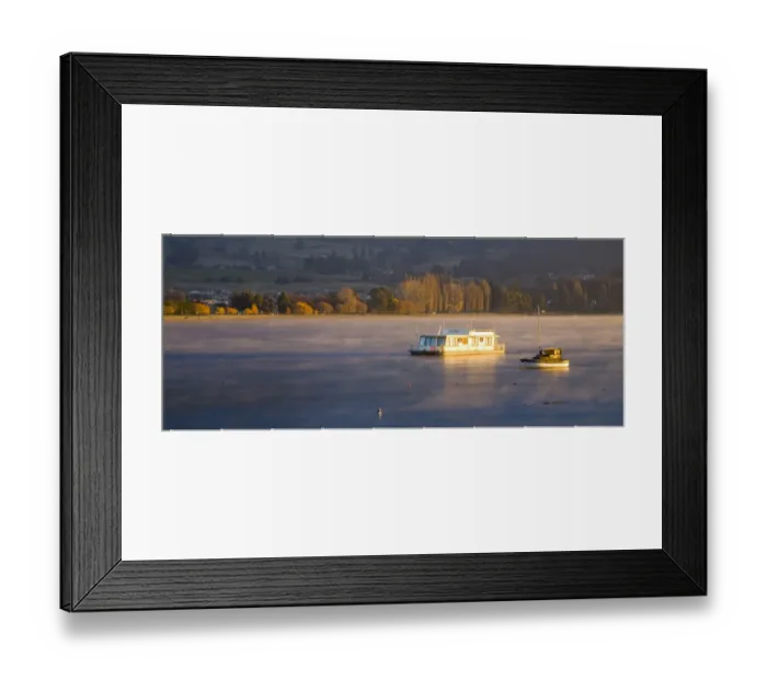 Framed Print : New Zealand, Otago, Lake Wanaka. The warm hues of sunset highlight the rising mist engulfing boats anchored on