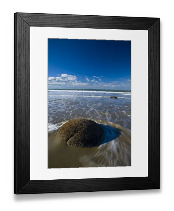 Framed Print : New Zealand, Otago, Moeraki Boulders. One of the famous spherical Moeraki boulders on the North Otago