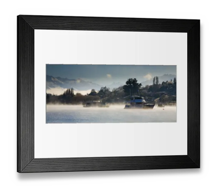 Framed Print : New Zealand, Otago, Lake Wanaka. Boats moored on Lake Wanaka engulfed by rising mist on a cold