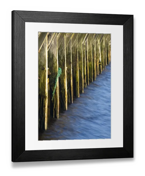 Framed Print : England, Tyne & Wear, North Shields. Abstract view of a wooden sea break located near the mouth of Framed Print : England, Tyne & Wear, North Shields. Abstract view of a wooden sea break located near the mouth of