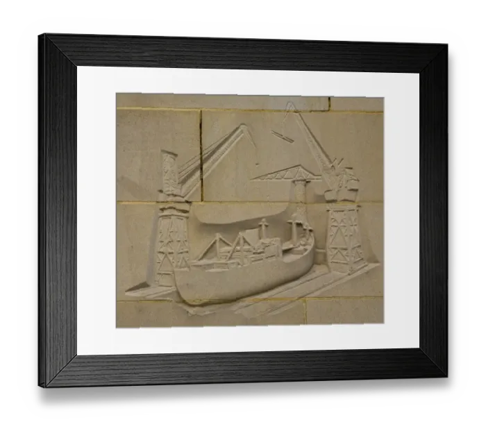 Framed Print : England, Tyne and Wear, Newcastle Upon Tyne. Carving on the reconstructed city wall near the quayside heralding the ship building heydays of Newcastle