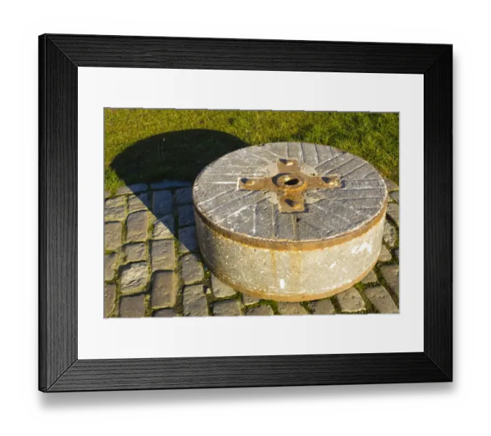 Framed Print : England, Tyne and Wear, Newcastle Upon Tyne. Granite mill-stone from the Gallowgate Lead Works which were located within Newcastle City for over 150 years, finally closing