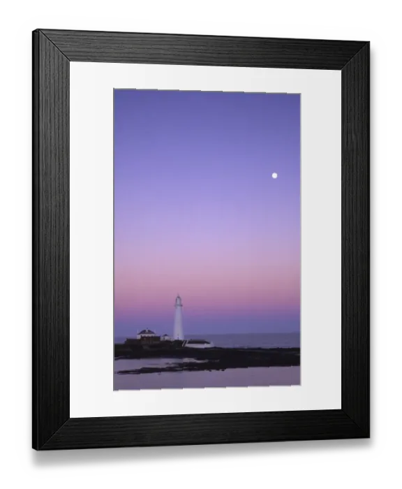 Framed Print : The popular landmark of the St Marys Island lighthouse photographed in January against a natural backdrop of a Framed Print : The popular landmark of the St Marys Island lighthouse photographed in January against a natural backdrop of a