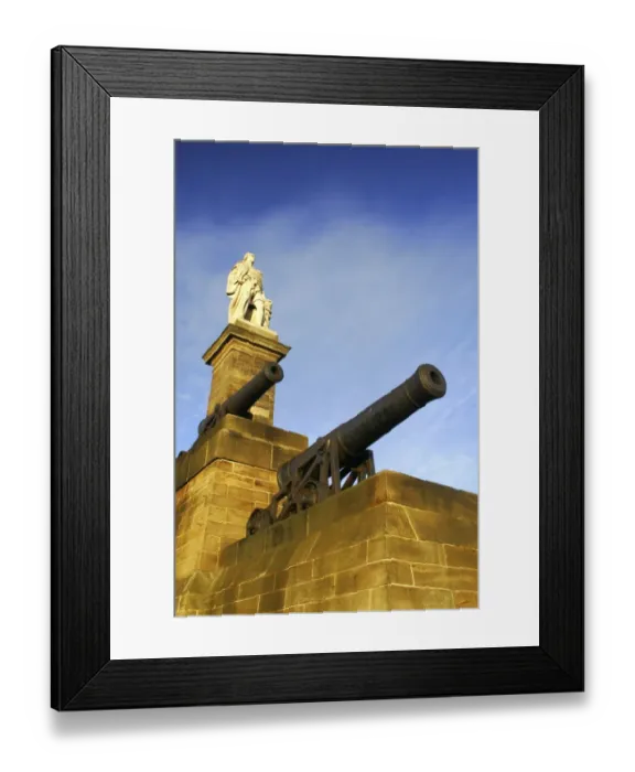 Framed Print : The setting sun iluminates the Collingwood monument and cannons. Collingwood Framed Print : The setting sun iluminates the Collingwood monument and cannons. Collingwood