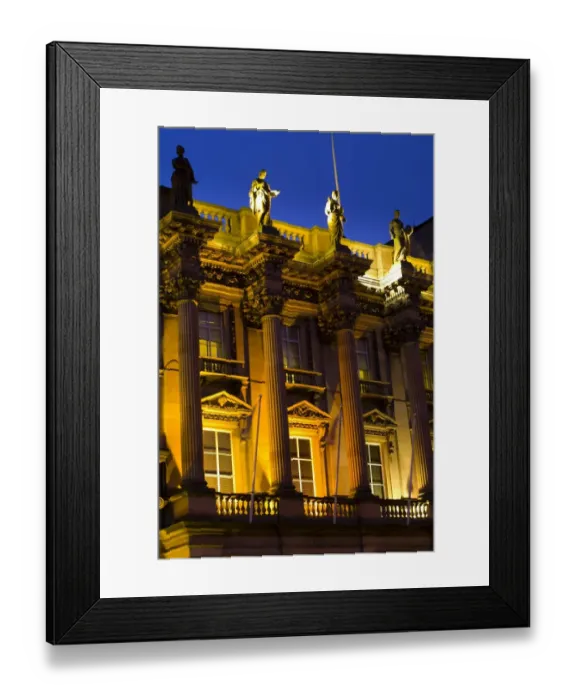 Framed Print : Scotland, Edinburgh, St Andrews Square. Statutes situated on a flood lit building in St Andrew s