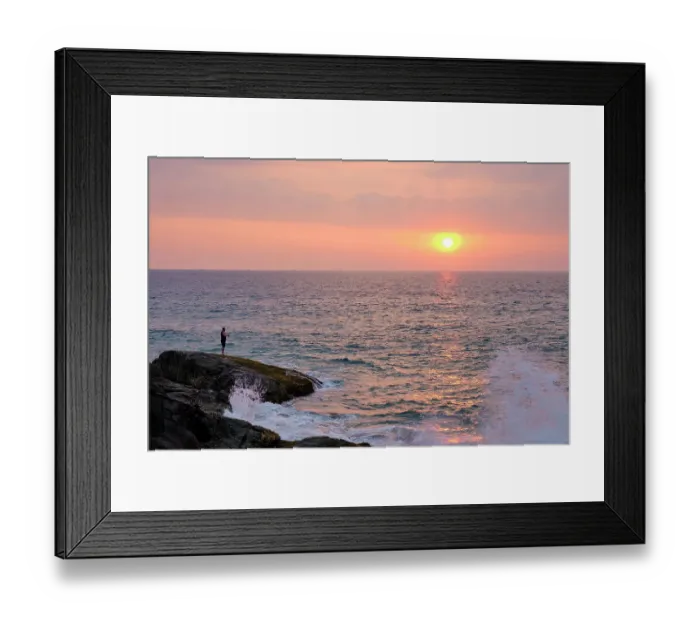 Framed Print : Sri Lanka, Galle District, Ahungalla. Tourist enjoys the sunset whilst fishing at Ahungalla Beach