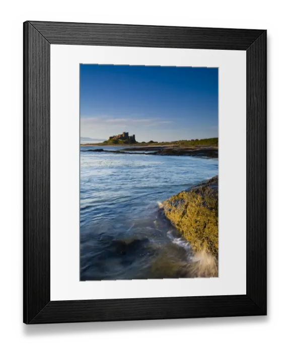 Framed Print : England, Northumberland, Bamburgh. Bamburgh Castle, beach and dunes viewed shortly after sunrise from