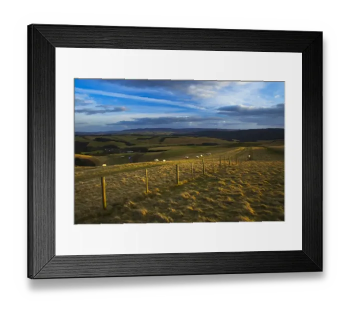 Framed Print : England, Northumberland, Northumberland National Park. A wire fencel running alongside the historic Clennell Steet route, as it heads towards Alwinton