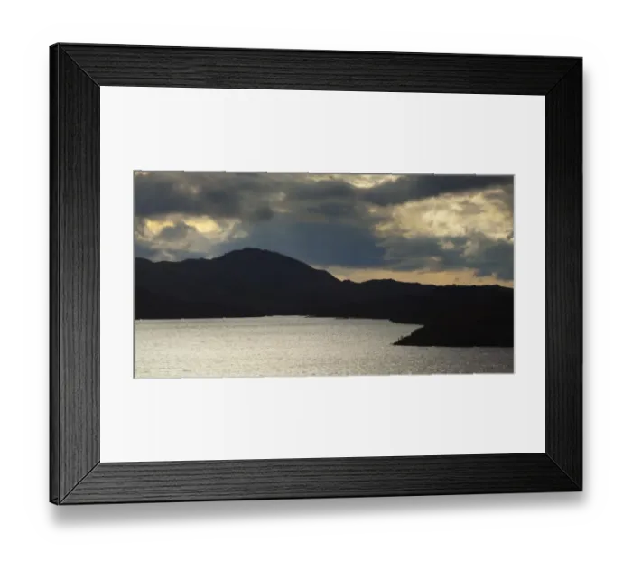Framed Print : Scotland, Scottish Highlands, Assynt. Clearing storm clouds above Loch Assynt near Lochinver