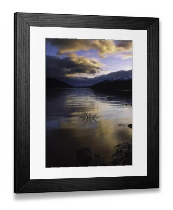 Framed Print : SCOTLAND, Scottish Highlands, Loch Laggan. A storm clears behind the peaks surrounding the still waters of Framed Print : SCOTLAND, Scottish Highlands, Loch Laggan. A storm clears behind the peaks surrounding the still waters of