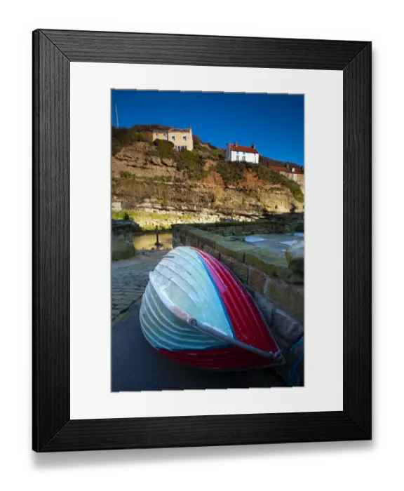 Framed Print : England, North Yorkshire, Staithes. Fishing boat moored near to a river in the old town of Staithes Framed Print : England, North Yorkshire, Staithes. Fishing boat moored near to a river in the old town of Staithes