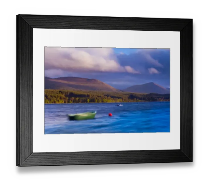 Framed Print : Scotland, Scottish Highlands, Cairngorms National Park. A stormy evening on Loch Morlich with the Cairngorm Moutain Range in
