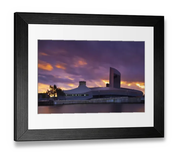 Framed Print : England, Greater Manchester, Salford Quays. Sunset behind the Imperial War Museum North