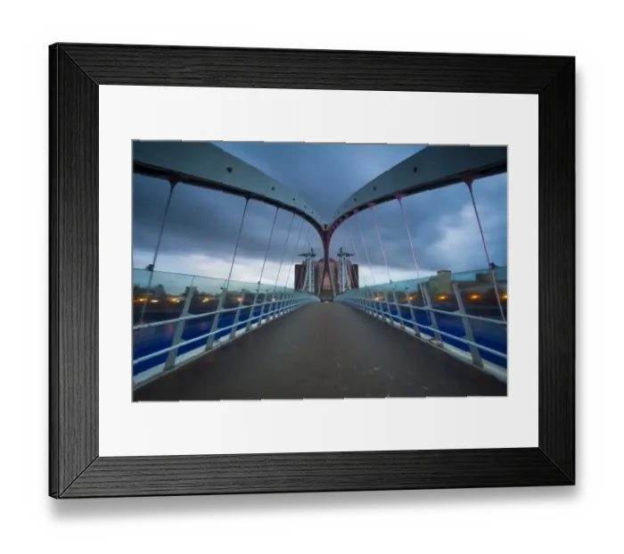 Framed Print : England, Greater Manchester, Salford Quays. The Lowry Bridge at dusk, located on the Salford Quays in the city of Salford near Manchester