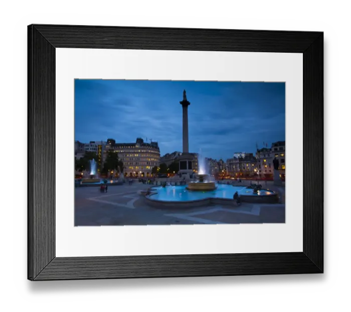 Framed Print : England, Greater London, City of Westminster. Nelsons Column and nearby fountains in Trafalgar Square, a popular tourist destination in London, photographed