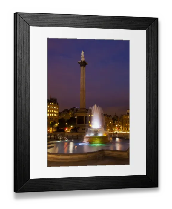 Framed Print : England, Greater London, City of Westminster. Nelsons Column and nearby fountains in Trafalgar Square, a popular tourist destination in London, photographed