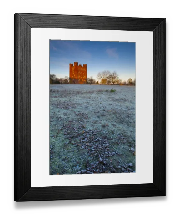 Framed Print : England, Lincolnshire, Tattershall Castle. Tattershall Castle, a red-brick medieval castle built by Ralph Cromwell, Lord Treasurer of England in 1434, on a frosty Framed Print : England, Lincolnshire, Tattershall Castle. Tattershall Castle, a red-brick medieval castle built by Ralph Cromwell, Lord Treasurer of England in 1434, on a frosty