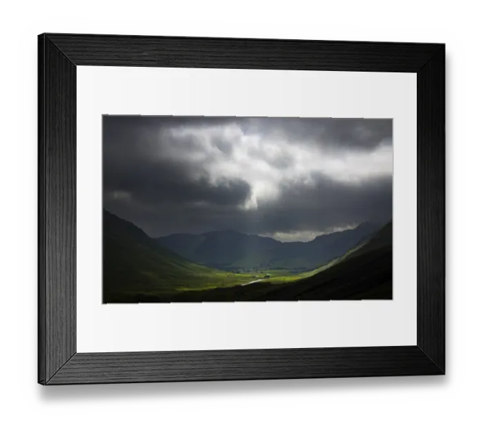 Framed Print : ENGLAND, Cumbria, Lake District National Park. A break in the storm clouds illuminates