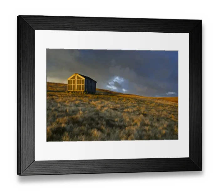 Framed Print : ENGLAND, Cumbria, Lake District National Park. The setting sun illuminates Lingy Hut