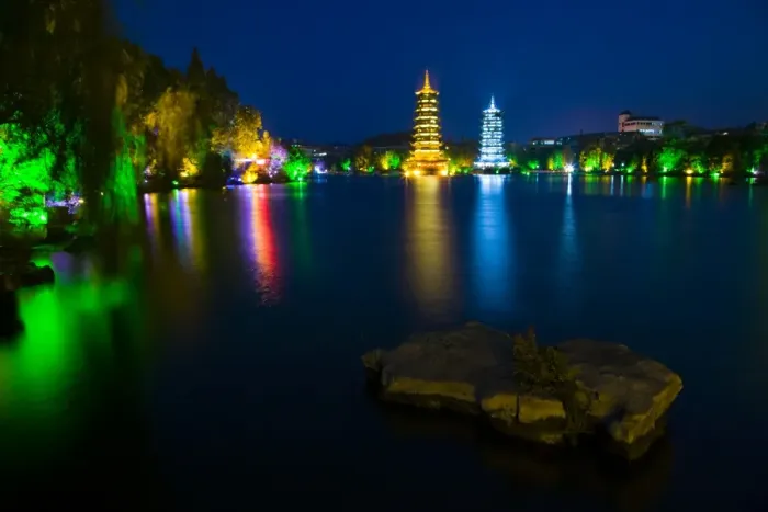Framed Print : China, Guangxi Zhuang Autonomous Region, Guilin City. Illuminated Pagodas at dusk