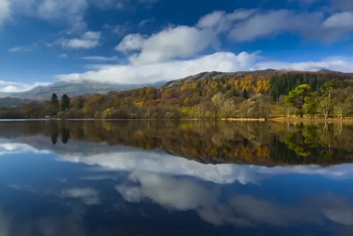 Framed Print : England, Cumbria, Lake District National Park. Lakeland hills reflected upon the still face of Coniston