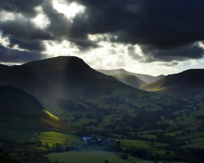 Framed Print : England, Cumbria, Lake District National Park. A shaft of light breaks through storm clouds above the north Framed Print : England, Cumbria, Lake District National Park. A shaft of light breaks through storm clouds above the north
