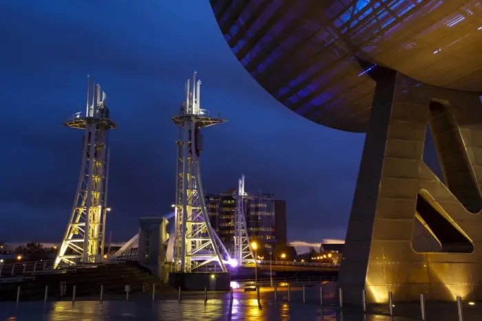 Framed Print : England, Greater Manchester, Salford Quays. The Lowry Centre at dusk looking towards the Lowry Bridge, located on the Salford Quays in the city of Salford near Manchester