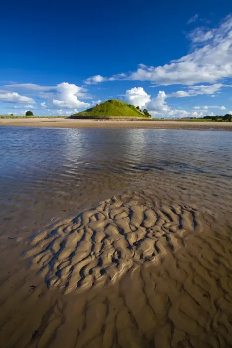 Framed Print : England, Northumberland, Alnmouth. The tidal Aln Estuary at Alnmouth. The hill in the distance is known as