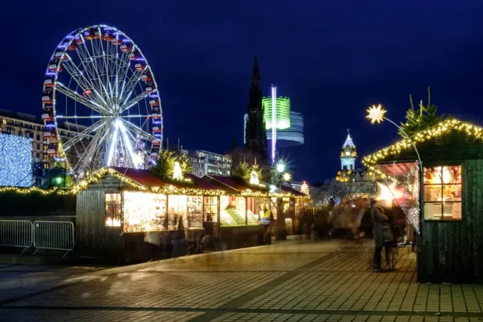 Framed Print : Scotland, Edinburgh, Princes Street Christmas Market. A traditional European Christmas Market located along Princes Street with the Scotts Monument and Balmoral Clock Tower in view