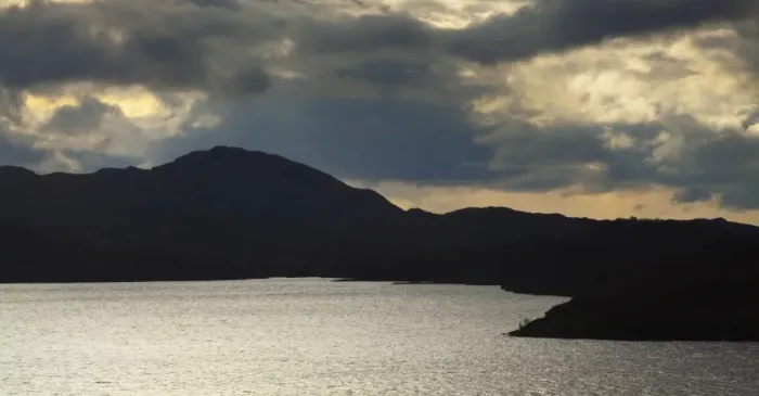 Framed Print : Scotland, Scottish Highlands, Assynt. Clearing storm clouds above Loch Assynt near Lochinver