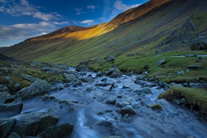England, Cumbria, The Lake District. The Gatesgarthdale Beck running downstream towards Bettermere from