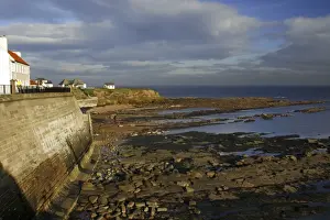 Tyne Book Prints: A sea wall built to defend the North Tyneside village of Cullercoats from the forces of the North Sea